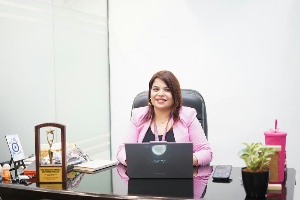 A business owner at her office desk